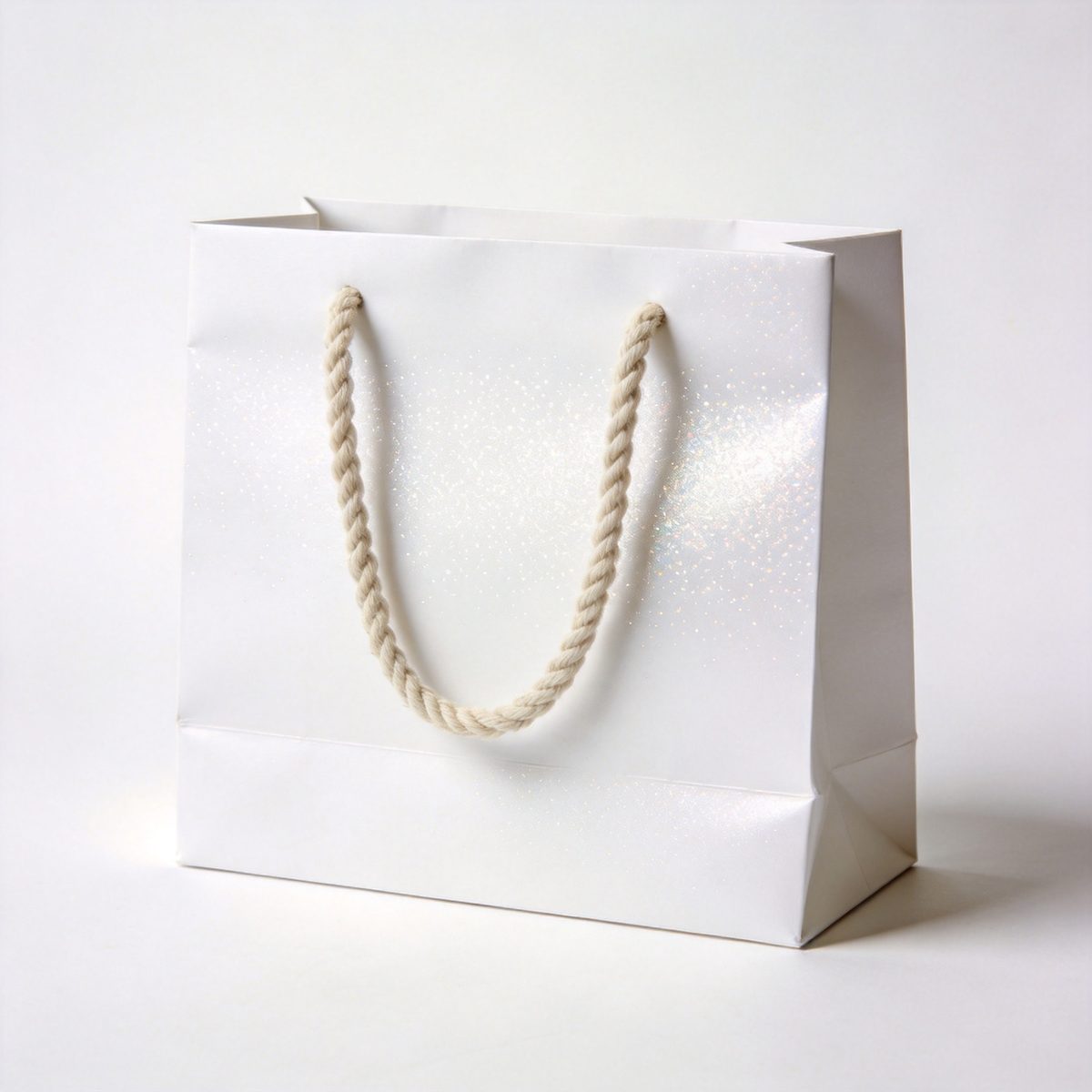 Premium white paper bag with spot UV coating and cotton rope handles