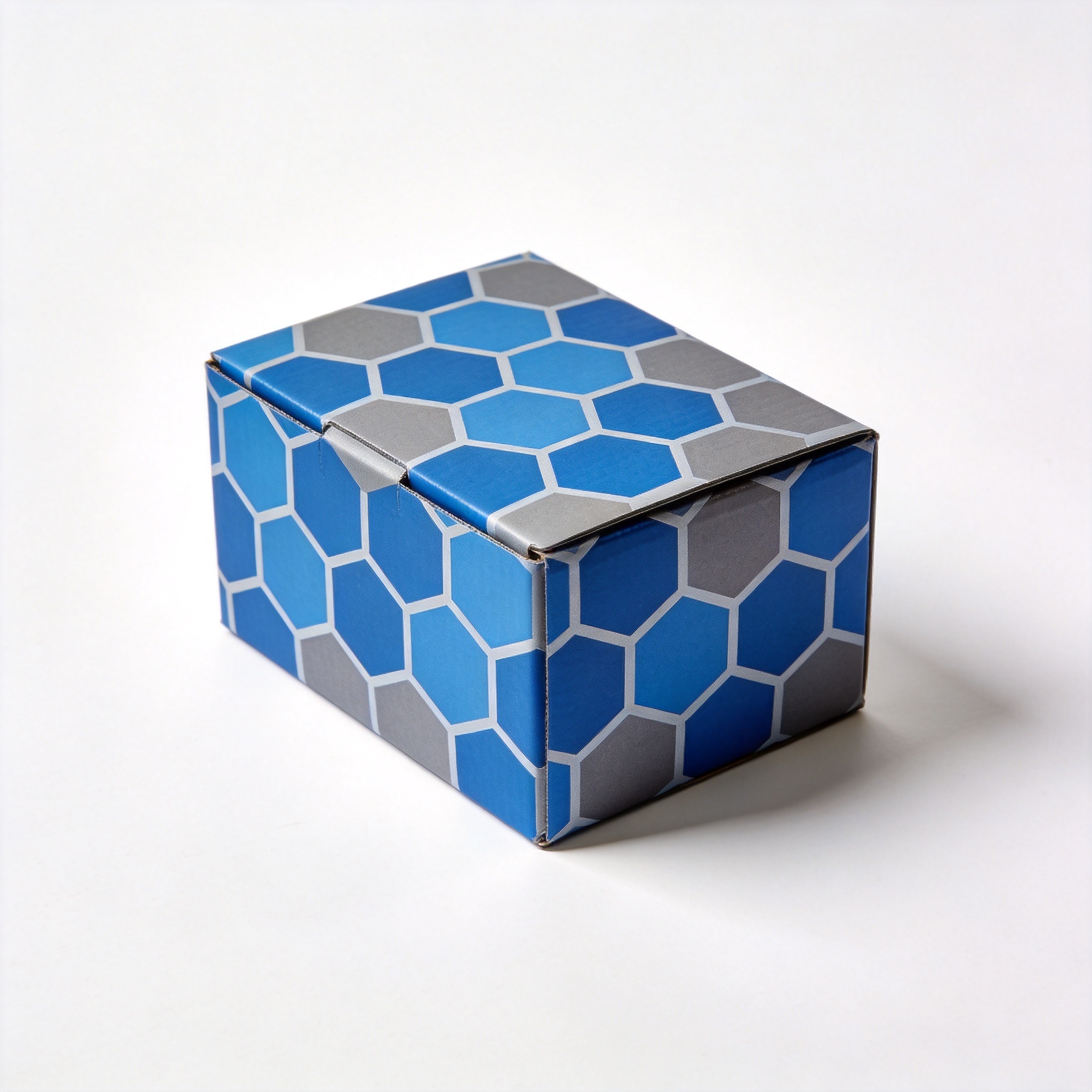 Single mailer box with blue and grey geometric hexagonal pattern